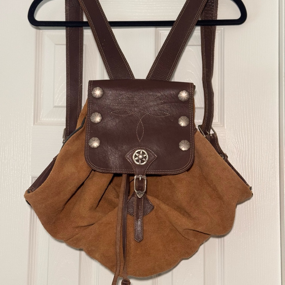 Festival ready bohemian western style leather & suede backpack.
